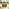 Marbella Beige Rattan 6 Seat Garden Dining Table with Firepit