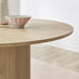 Penrose Oak Round Dining Table & 4 Black Calla Faux Leather Chairs