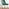 Novara 100cm Gold Round Dining Table and 4 Green Pesaro Gold Leg Chairs
