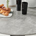 Novara Grey Concrete Effect Black Leg Round Dining Table & 4 Grey Pesaro Black Leg Chairs