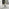 Novara White Marble Black Leg Round Dining Table & 4 Grey Calla Black Leg Chairs