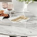 Novara White Marble Black Leg 120cm Round Dining Table & 6 Grey Belgravia Black Leg Chairs