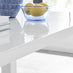 Pivero White High Gloss Dining Table And 4 Black Isco Chairs Set